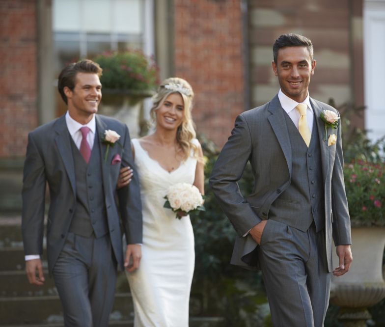 Wedding wear, man in suits and bride in wedding dress