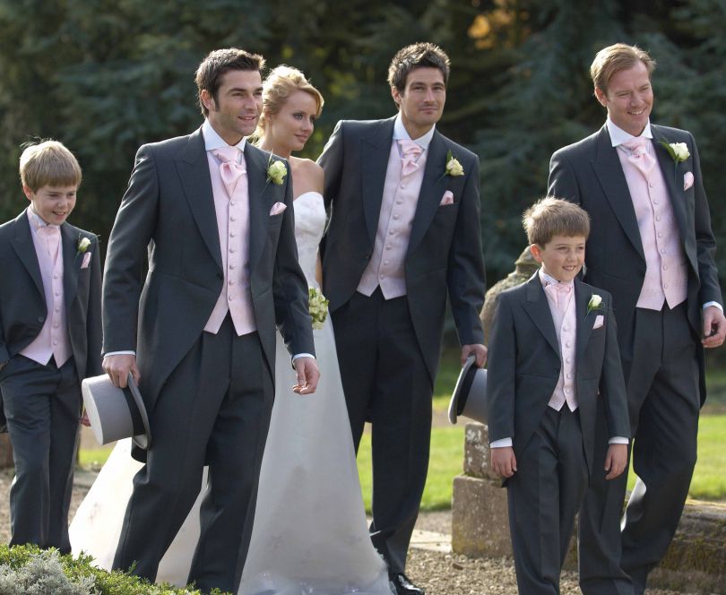 Wedding, men dressed in tailcoats suits